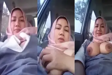 Tante Jilbab Pamer Toket Gede Naik Mobil Sampe Basah poster